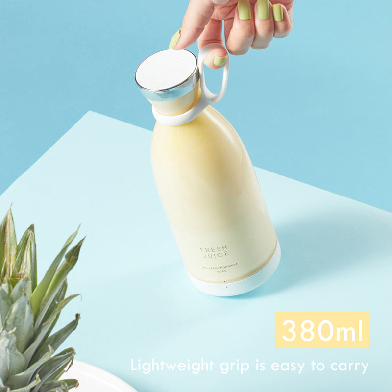 Bärbar elektrisk juicekopp